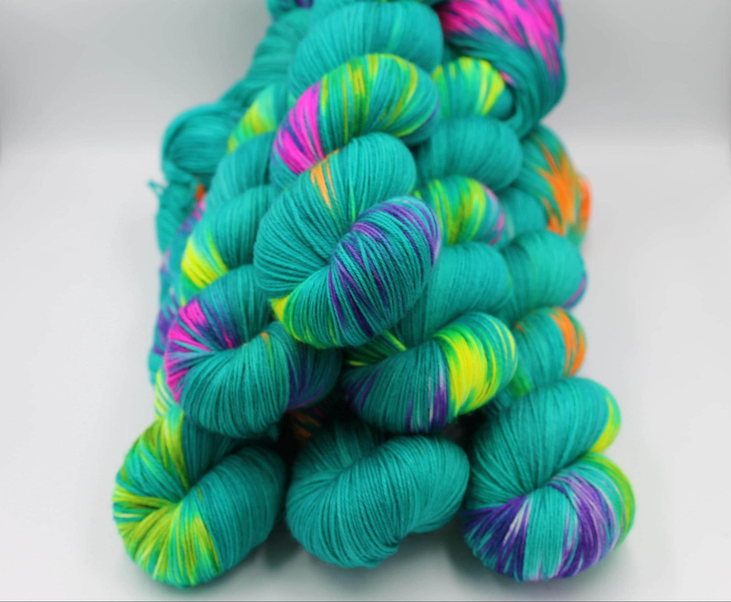 Neon Peacock, Sock Skein 75% SuperWash Merino and 25 Nylon Hand Dyed Yarn 100g