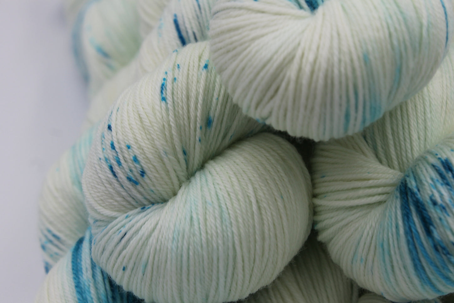 Lagoon Light Speckle Sock Skein 75% SuperWash Merino and 25 Nylon Hand Dyed Yarn 100g