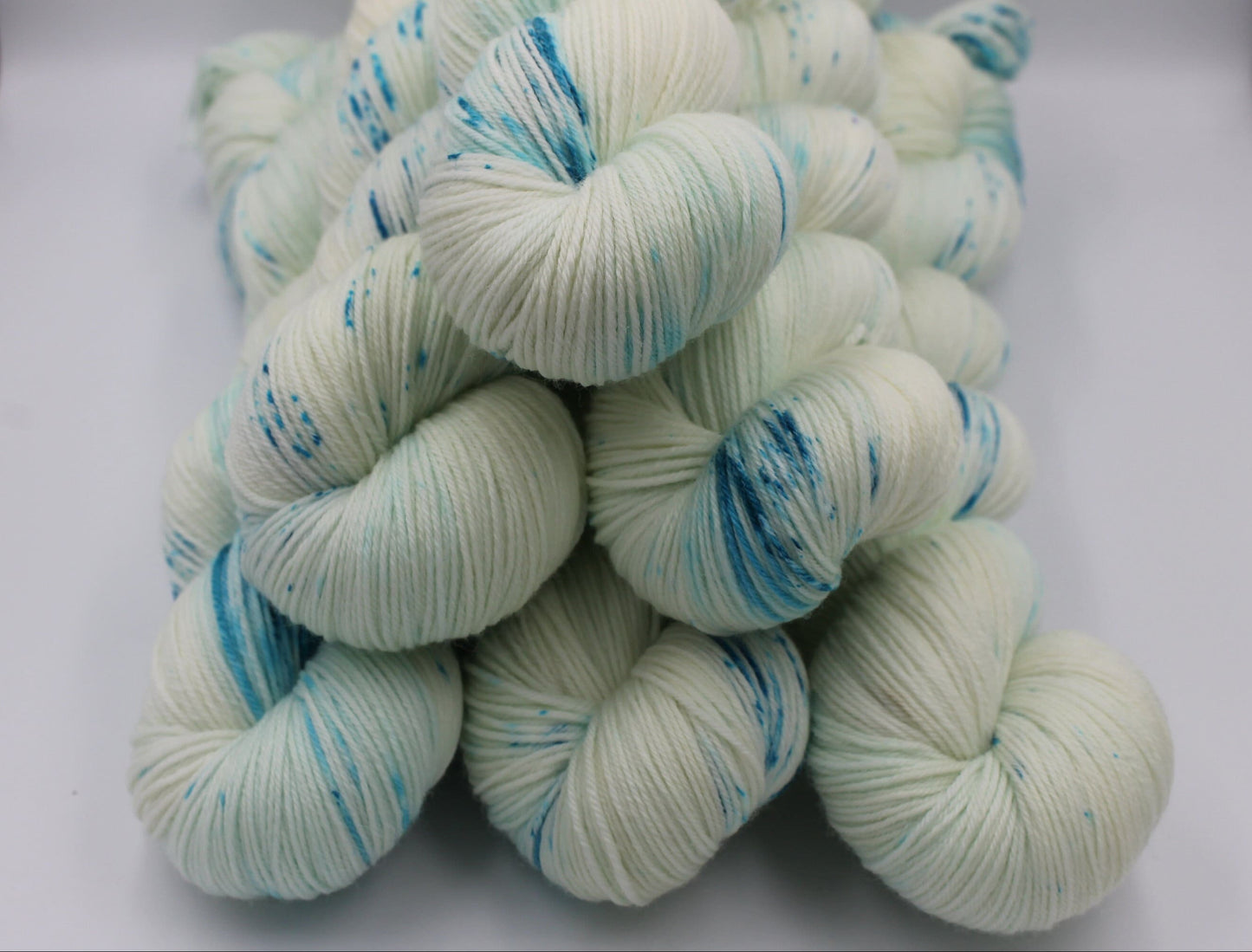 Lagoon Light Speckle Sock Skein 75% SuperWash Merino and 25 Nylon Hand Dyed Yarn 100g