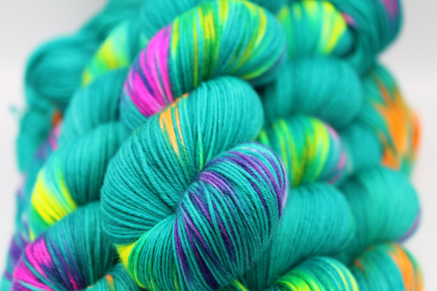 Neon Peacock, Sock Skein 75% SuperWash Merino and 25 Nylon Hand Dyed Yarn 100g