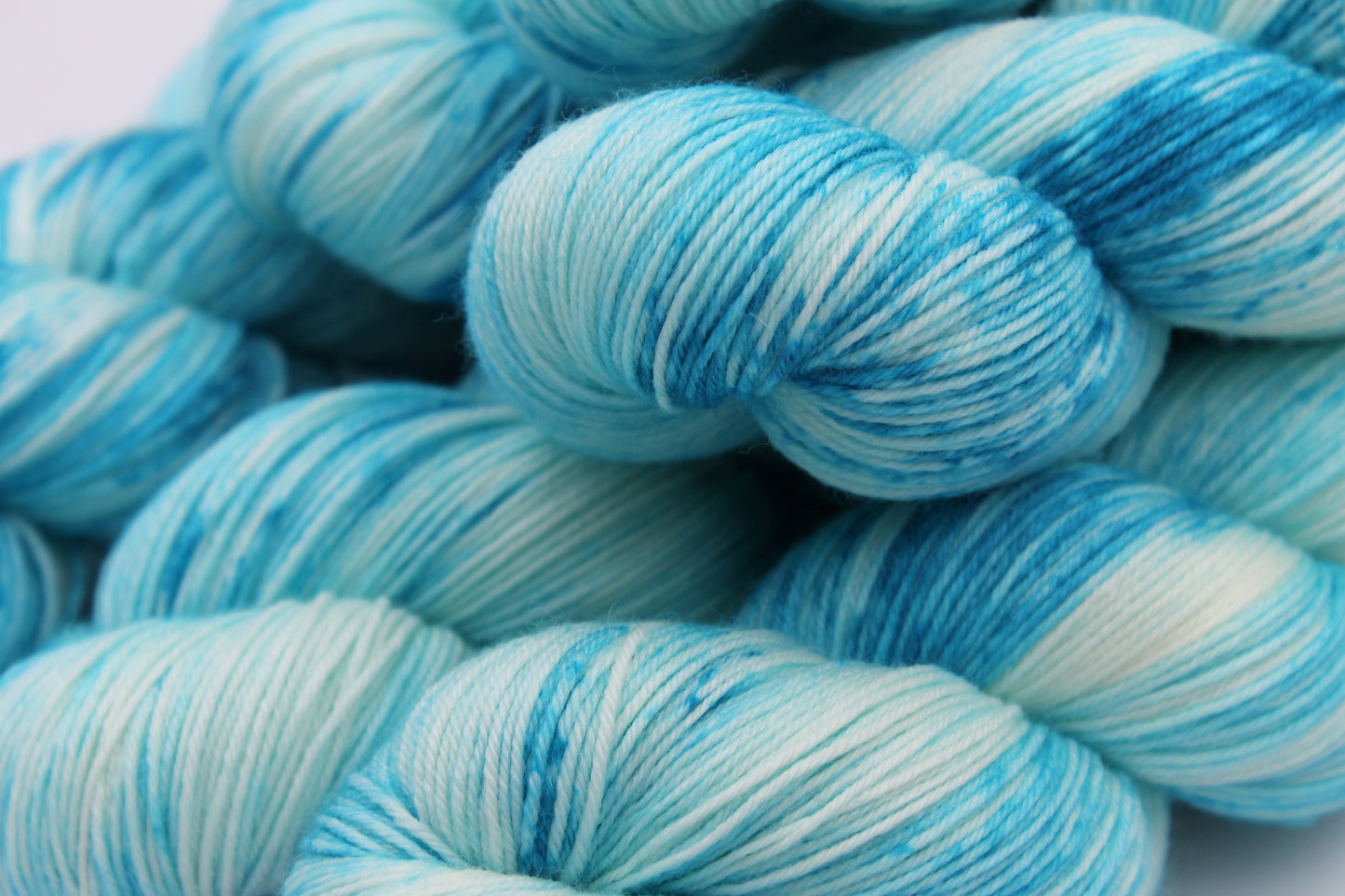 Lagoon Deep Speckle Sock Skein 75% SuperWash Merino and 25 Nylon Hand Dyed Yarn 100g
