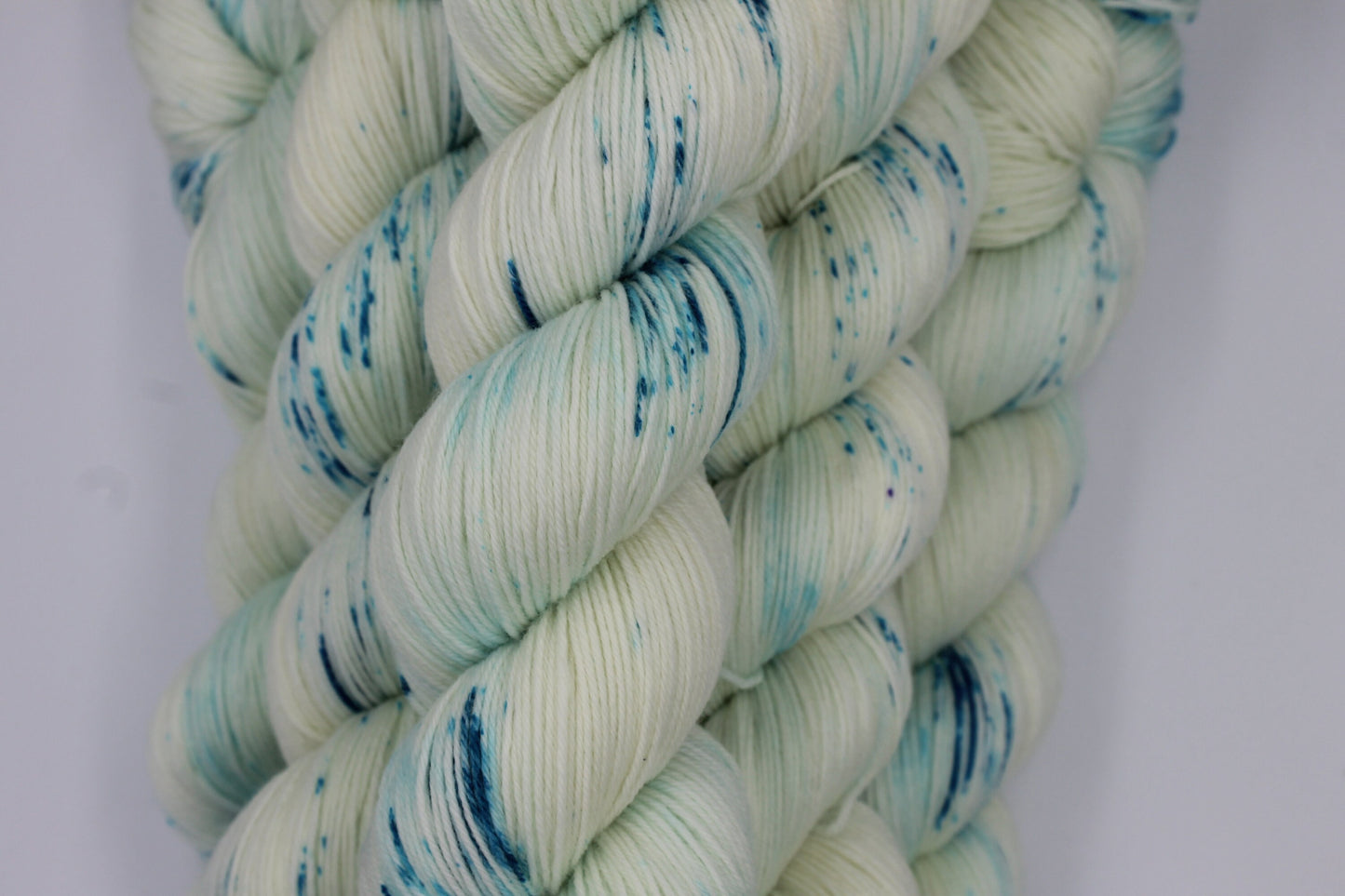 Lagoon Light Speckle Sock Skein 75% SuperWash Merino and 25 Nylon Hand Dyed Yarn 100g