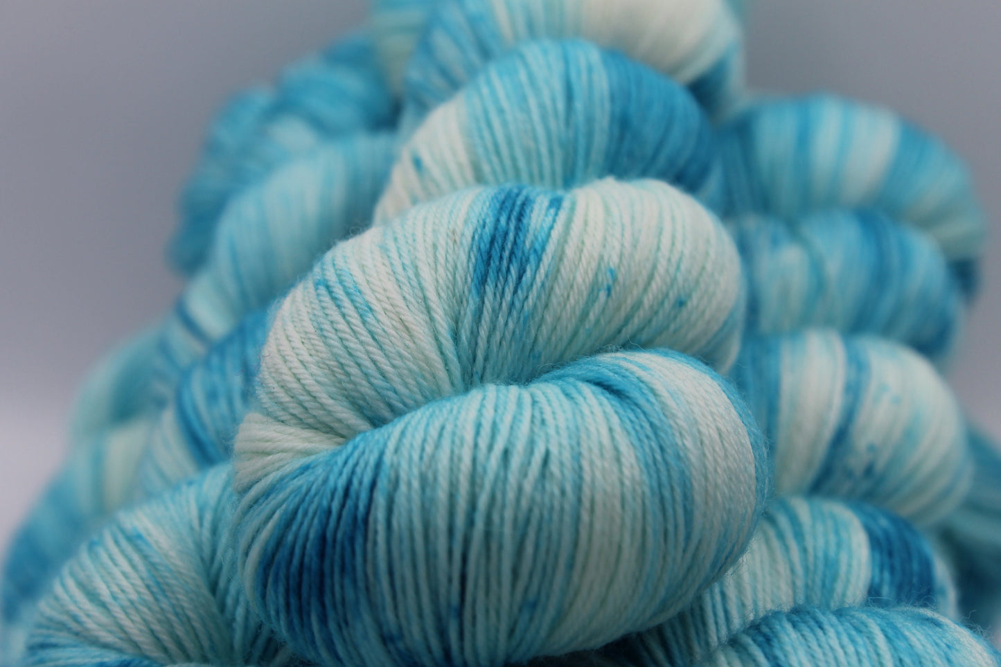 Lagoon Deep Speckle Sock Skein 75% SuperWash Merino and 25 Nylon Hand Dyed Yarn 100g