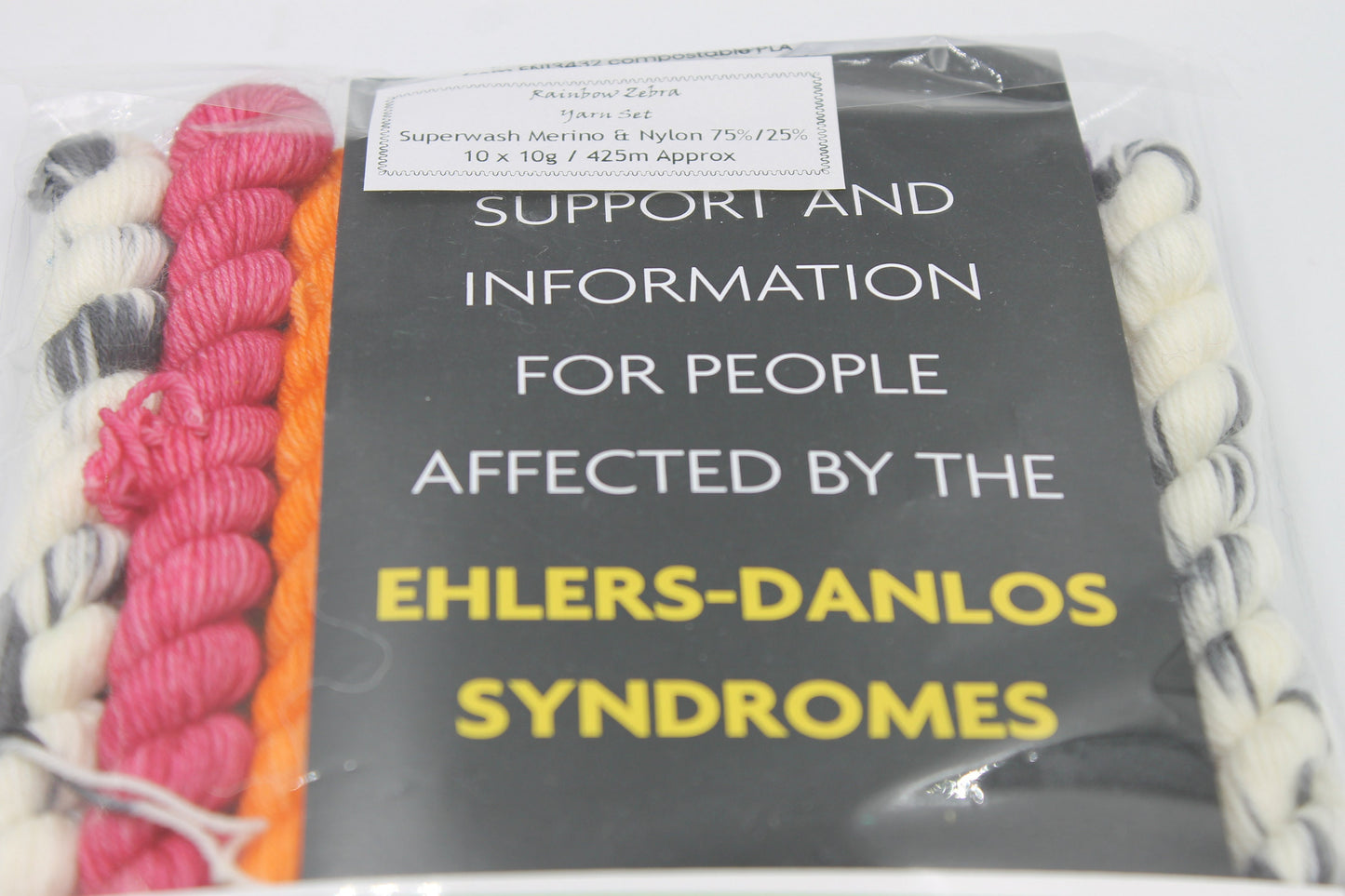 Rainbow Zebra Micro Skein Gift Set Sock 75% SuperWash Merino and 25 Nylon 10 x 10g with Spot The Zebra pin and EDS band