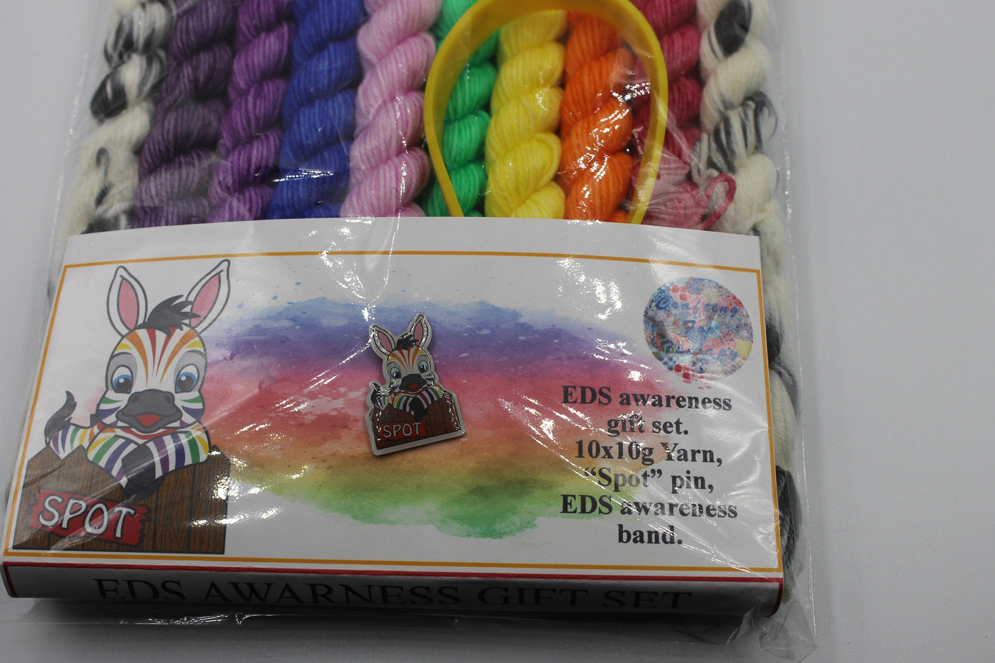 Rainbow Zebra Micro Skein Gift Set Sock 75% SuperWash Merino and 25 Nylon 10 x 10g with Spot The Zebra pin and EDS band