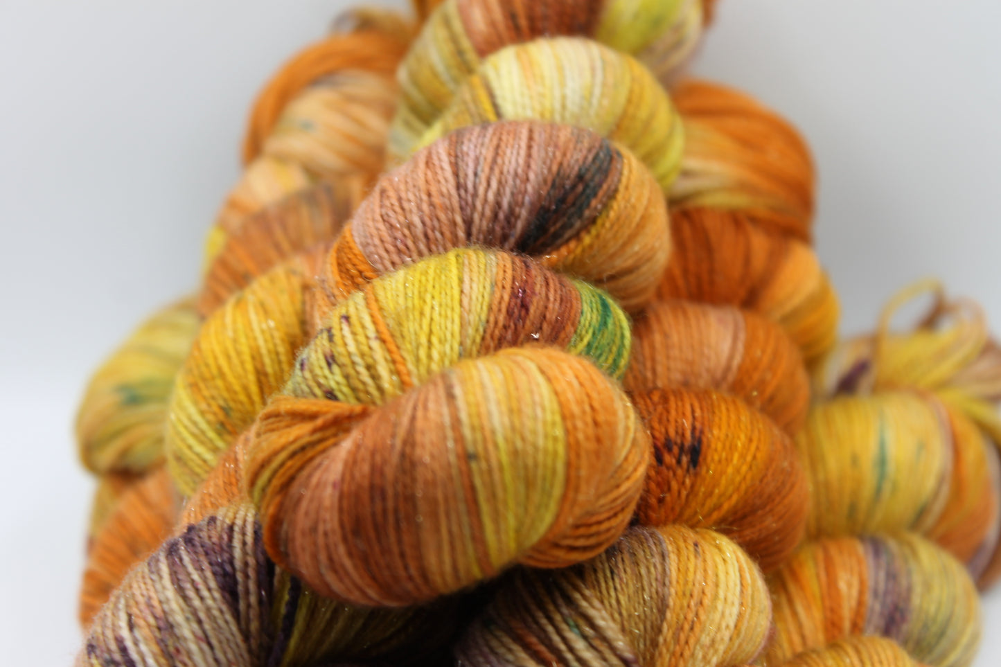 Pumpkin Glitterball Sock Skein 75% Superwash Merino 20% Nylon 5% Silver Stellina