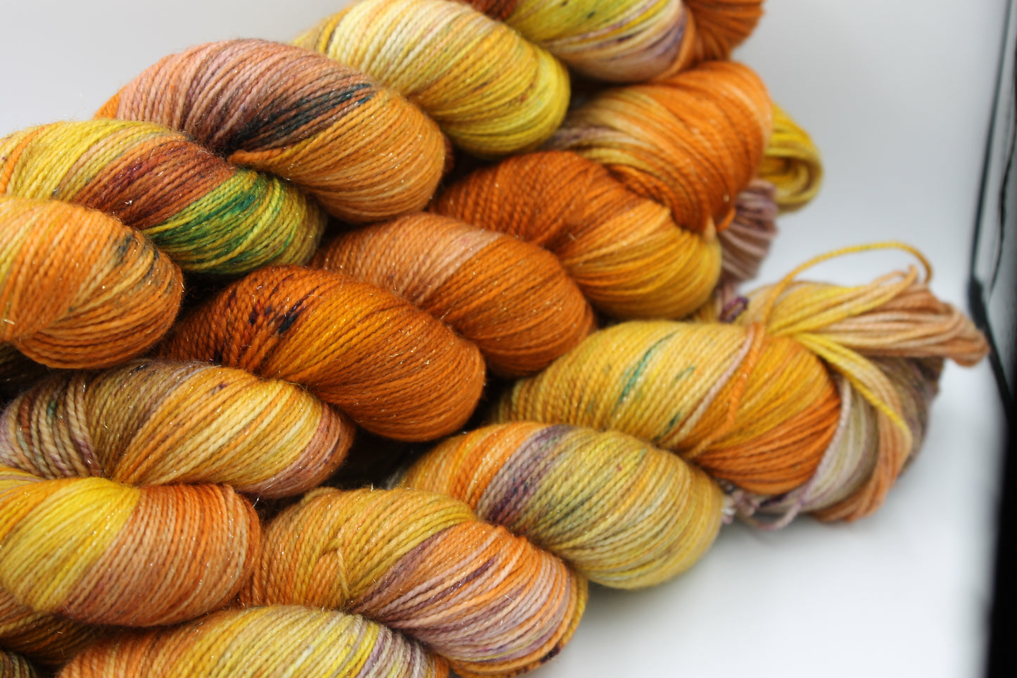 Pumpkin Glitterball Sock Skein 75% Superwash Merino 20% Nylon 5% Silver Stellina