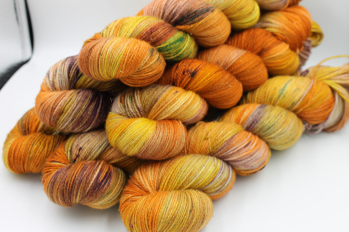 Pumpkin Glitterball Sock Skein 75% Superwash Merino 20% Nylon 5% Silver Stellina