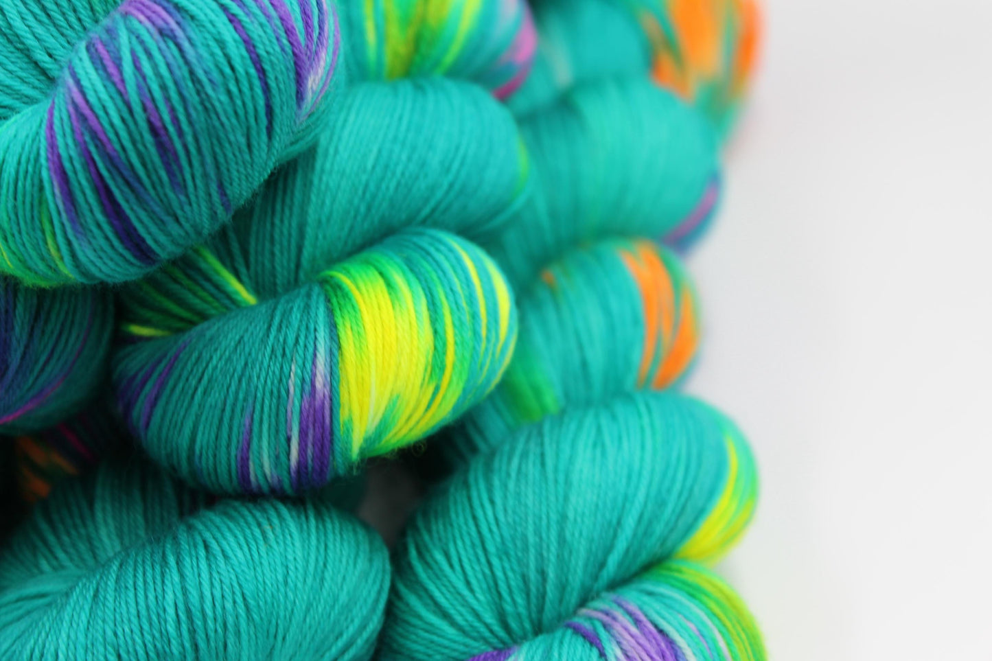 Neon Peacock, Sock Skein 75% SuperWash Merino and 25 Nylon Hand Dyed Yarn 100g
