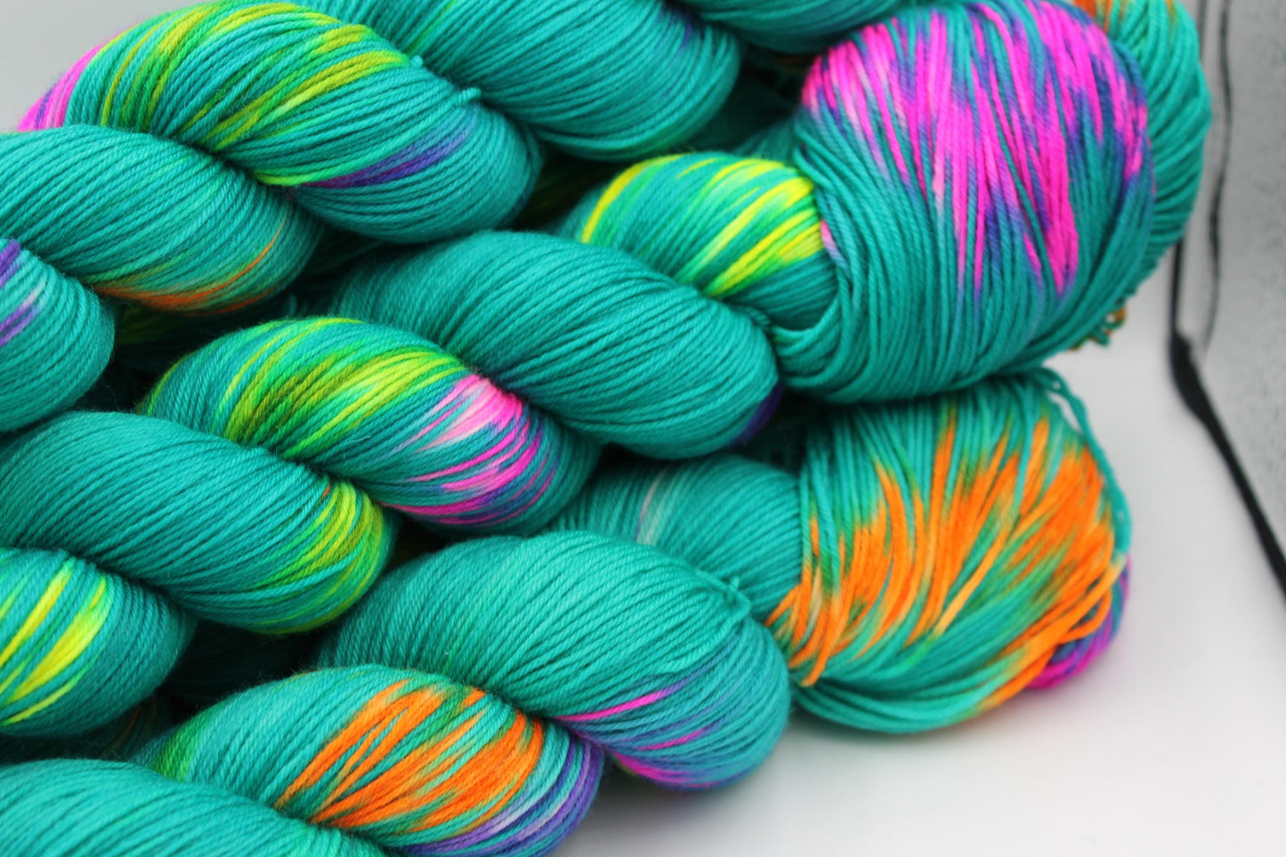 Neon Peacock, Sock Skein 75% SuperWash Merino and 25 Nylon Hand Dyed Yarn 100g