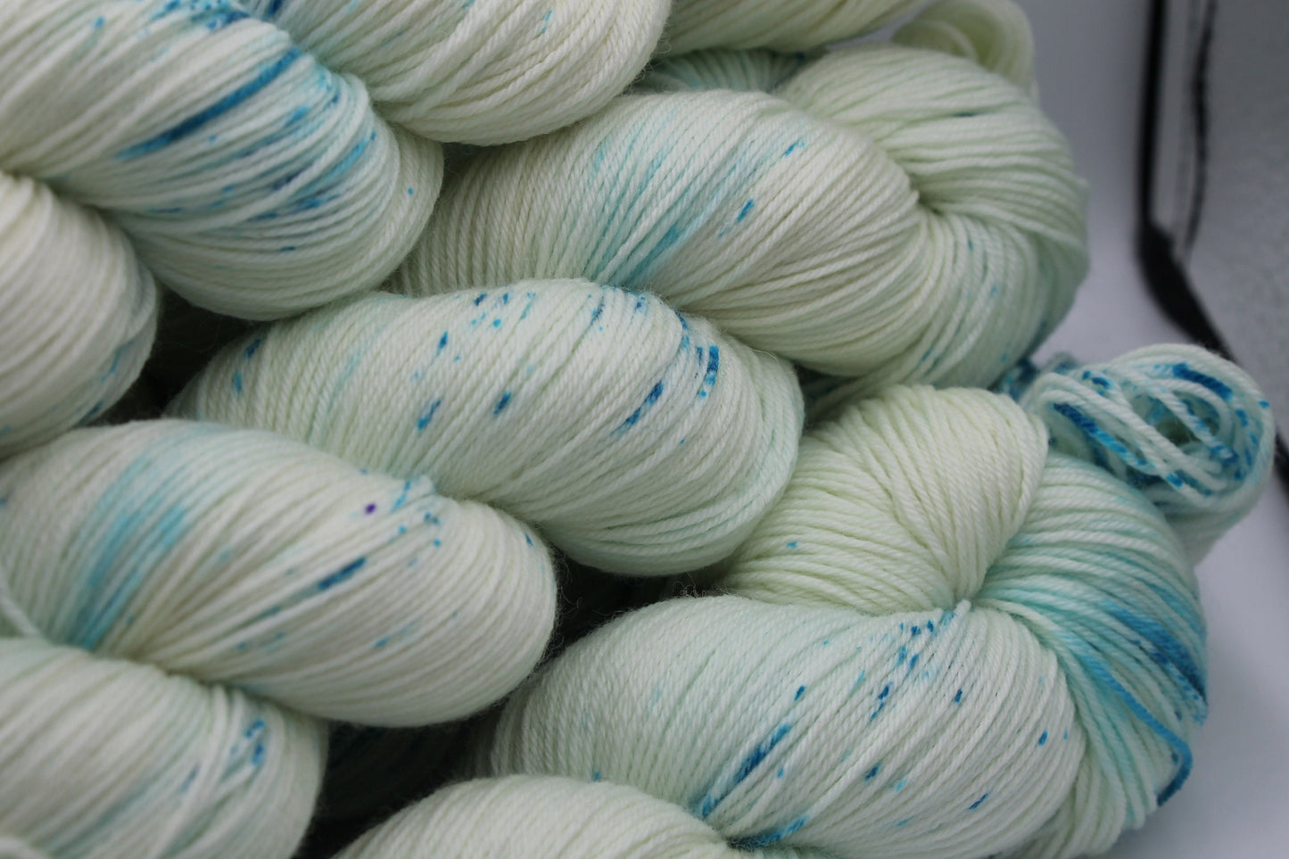 Lagoon Light Speckle Sock Skein 75% SuperWash Merino and 25 Nylon Hand Dyed Yarn 100g