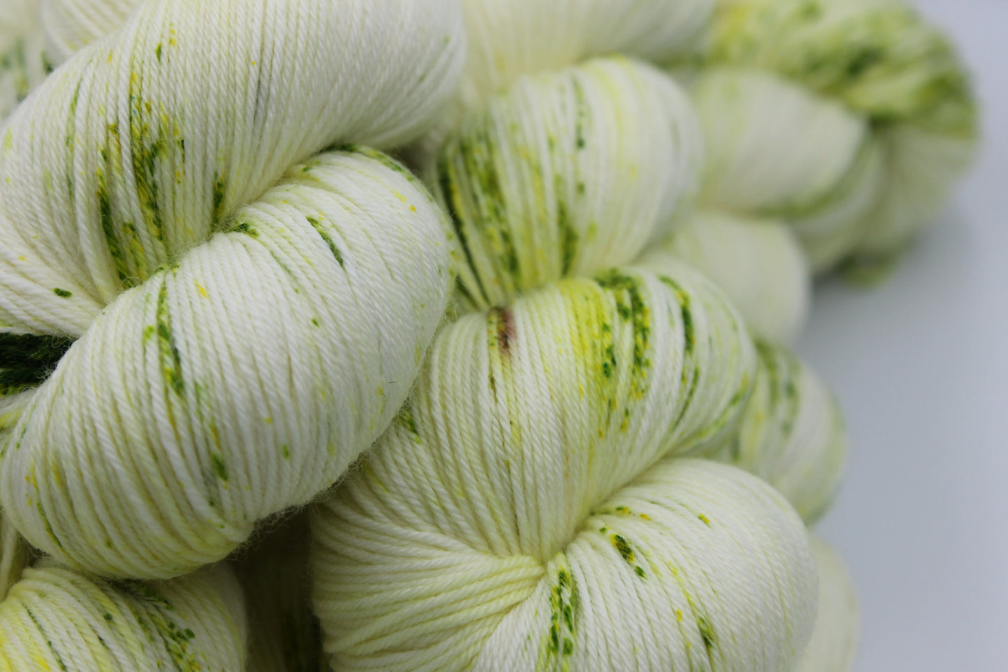 Chartreuse Light Speckle Sock Skein 75% SuperWash Merino and 25 Nylon Hand Dyed Yarn 100g