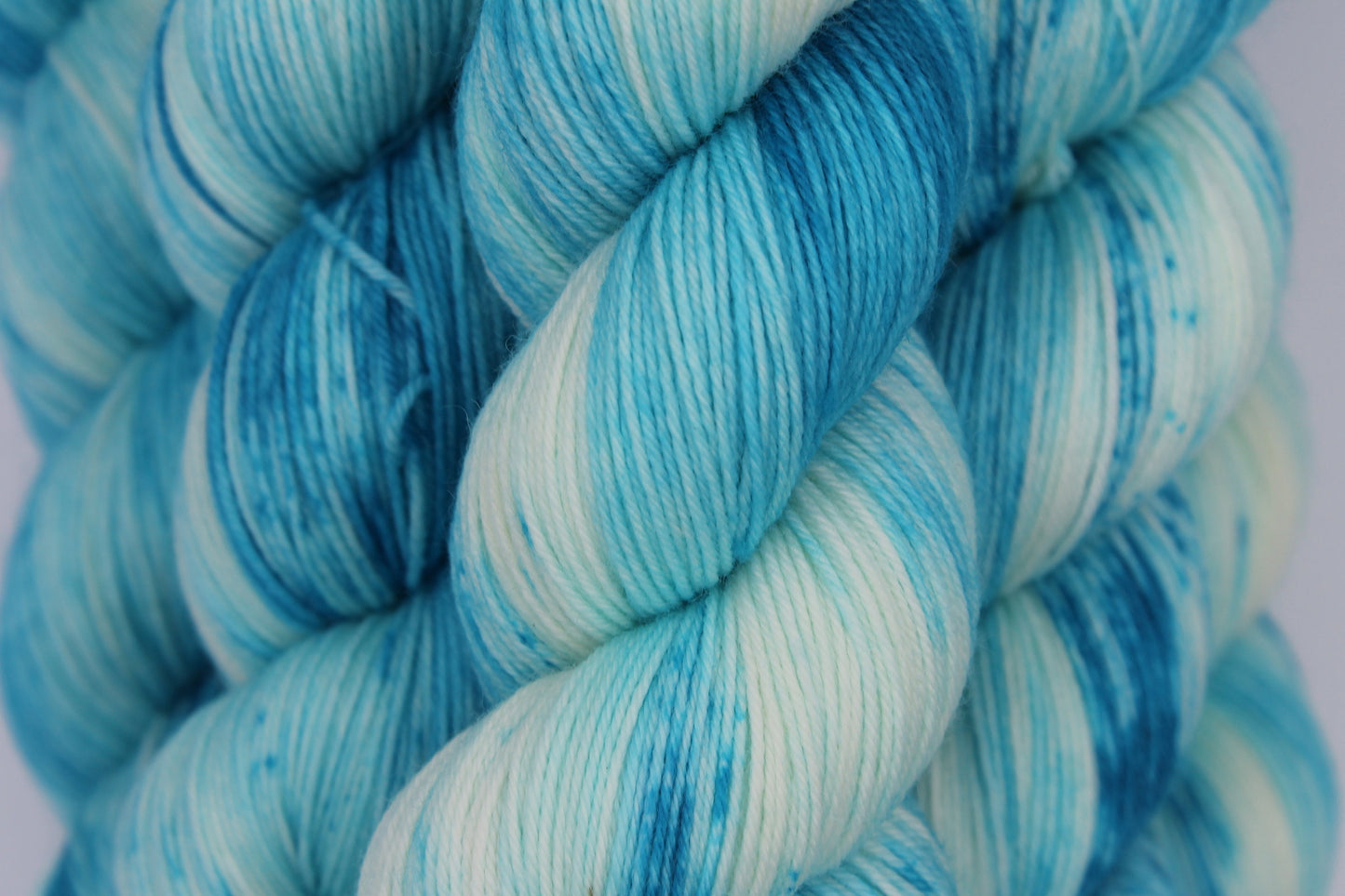 Lagoon Deep Speckle Sock Skein 75% SuperWash Merino and 25 Nylon Hand Dyed Yarn 100g