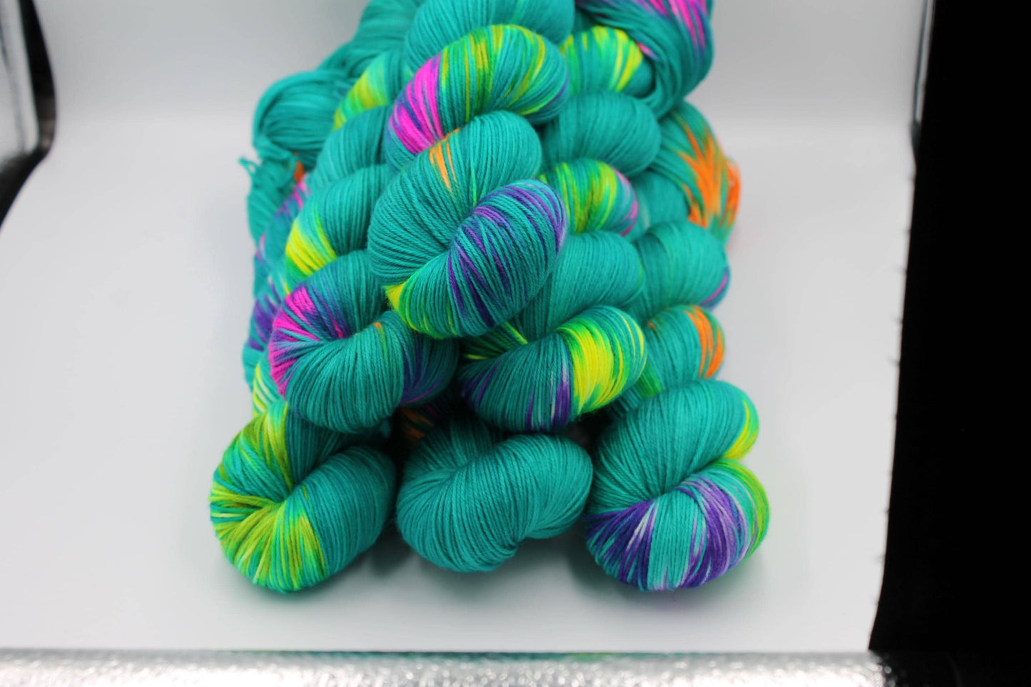 Neon Peacock, Sock Skein 75% SuperWash Merino and 25 Nylon Hand Dyed Yarn 100g