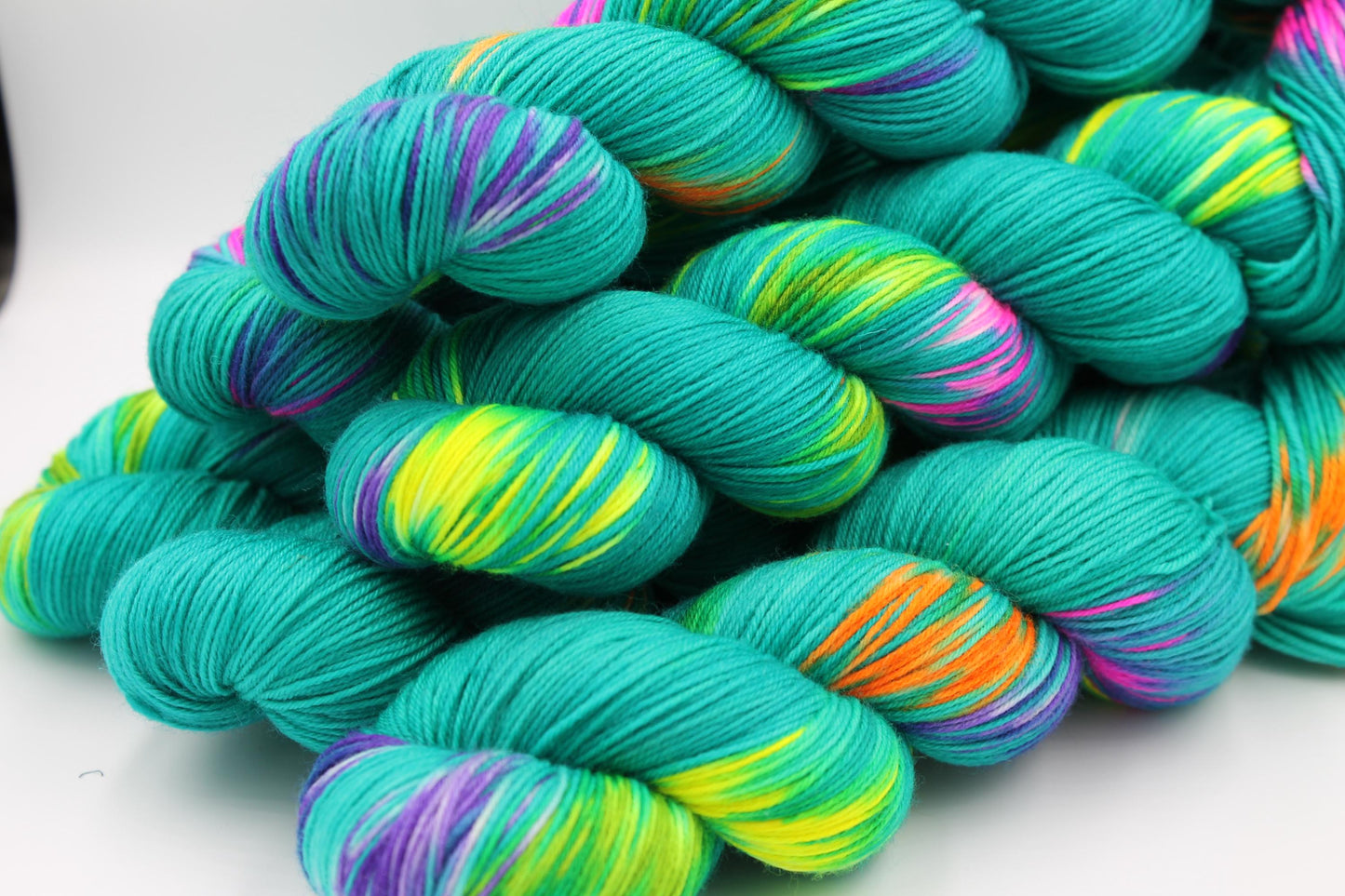 Neon Peacock, Sock Skein 75% SuperWash Merino and 25 Nylon Hand Dyed Yarn 100g