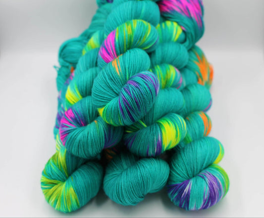 Neon Peacock,  Sock Skein 75% SuperWash Merino and 25 Nylon Hand Dyed Yarn 100g