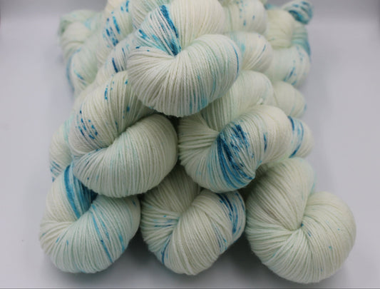 Lagoon Light Speckle Sock Skein 75% SuperWash Merino and 25 Nylon Hand Dyed Yarn 100g