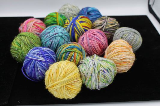 Pink Bear and Jemimas Mystery Blanket Balls Premium Sock SuperWash Wool 12 x 10g, Paw Wound
