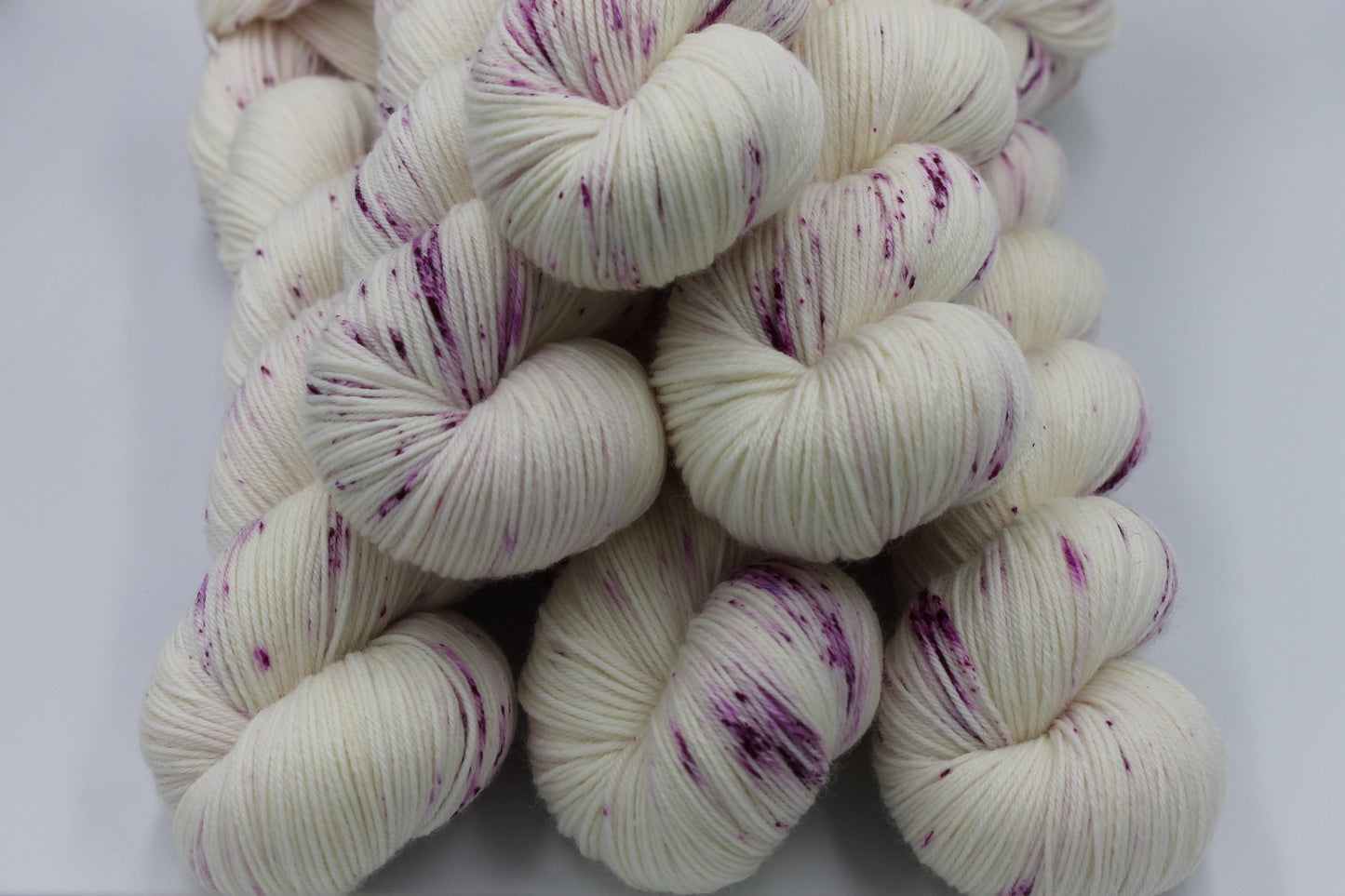 Wild Raspberry Light Speckle Sock Skein 75% SuperWash Merino and 25 Nylon Hand Dyed Yarn 100g