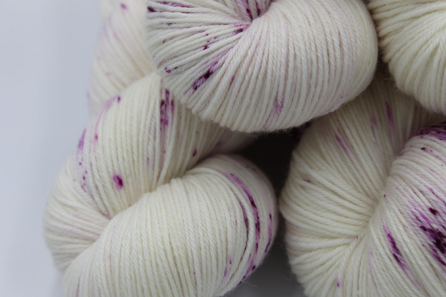 Wild Raspberry Light Speckle Sock Skein 75% SuperWash Merino and 25 Nylon Hand Dyed Yarn 100g