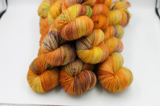 Pumpkin Glitterball  Sock Skein 75% Superwash Merino 20% Nylon 5% Silver Stellina