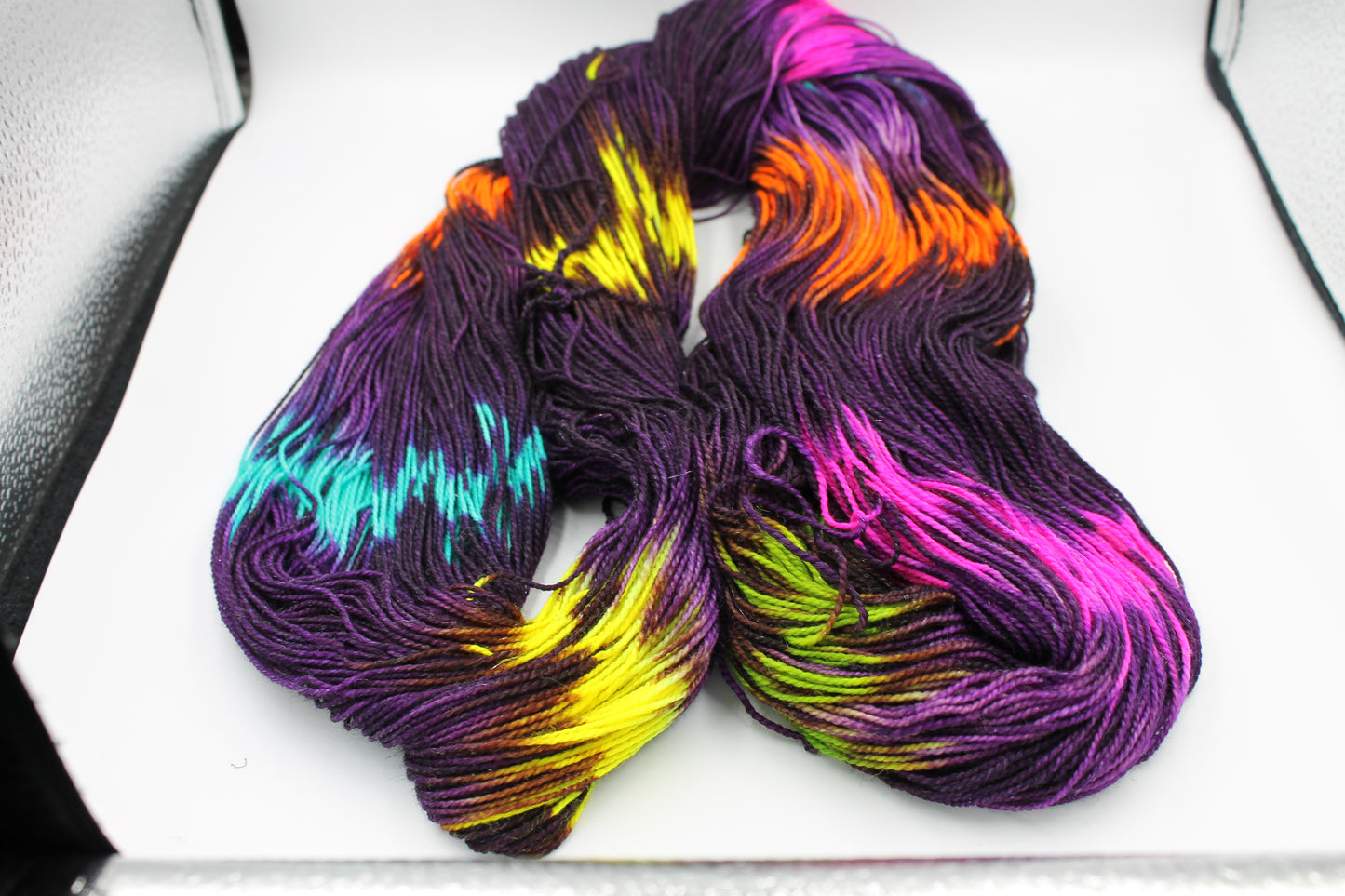 Blackpool Illuminations Sock Yarn Skein with 75% Superwash Merino, 20% Nylon, and 5% Silver Stellina