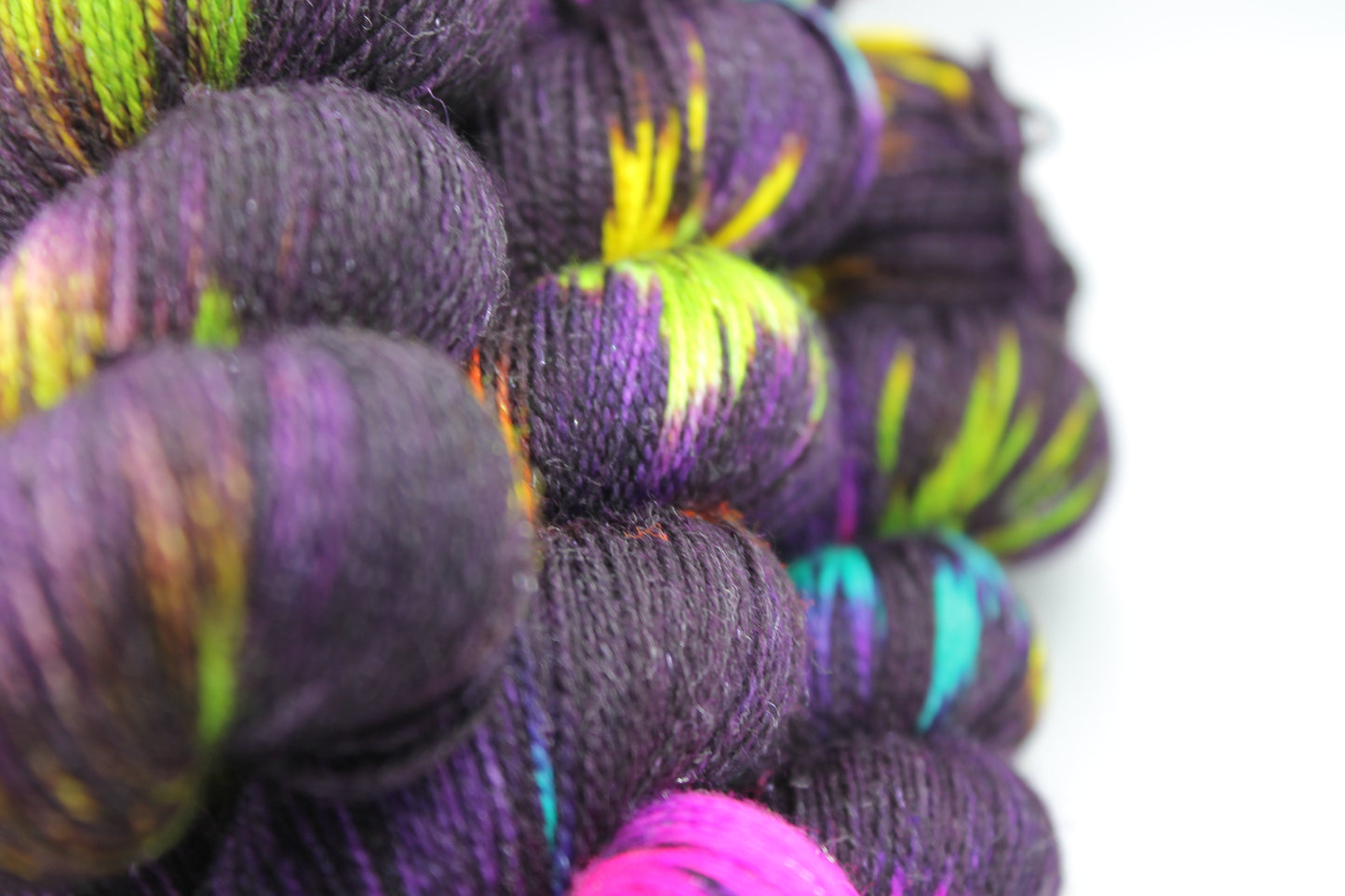 Blackpool Illuminations Sock Yarn Skein with 75% Superwash Merino, 20% Nylon, and 5% Silver Stellina