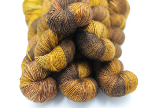Toasted Honey Hand Dyed Yarn - 60% SuperWash Merino, 20% Silk, 20% Yak Sock Skein