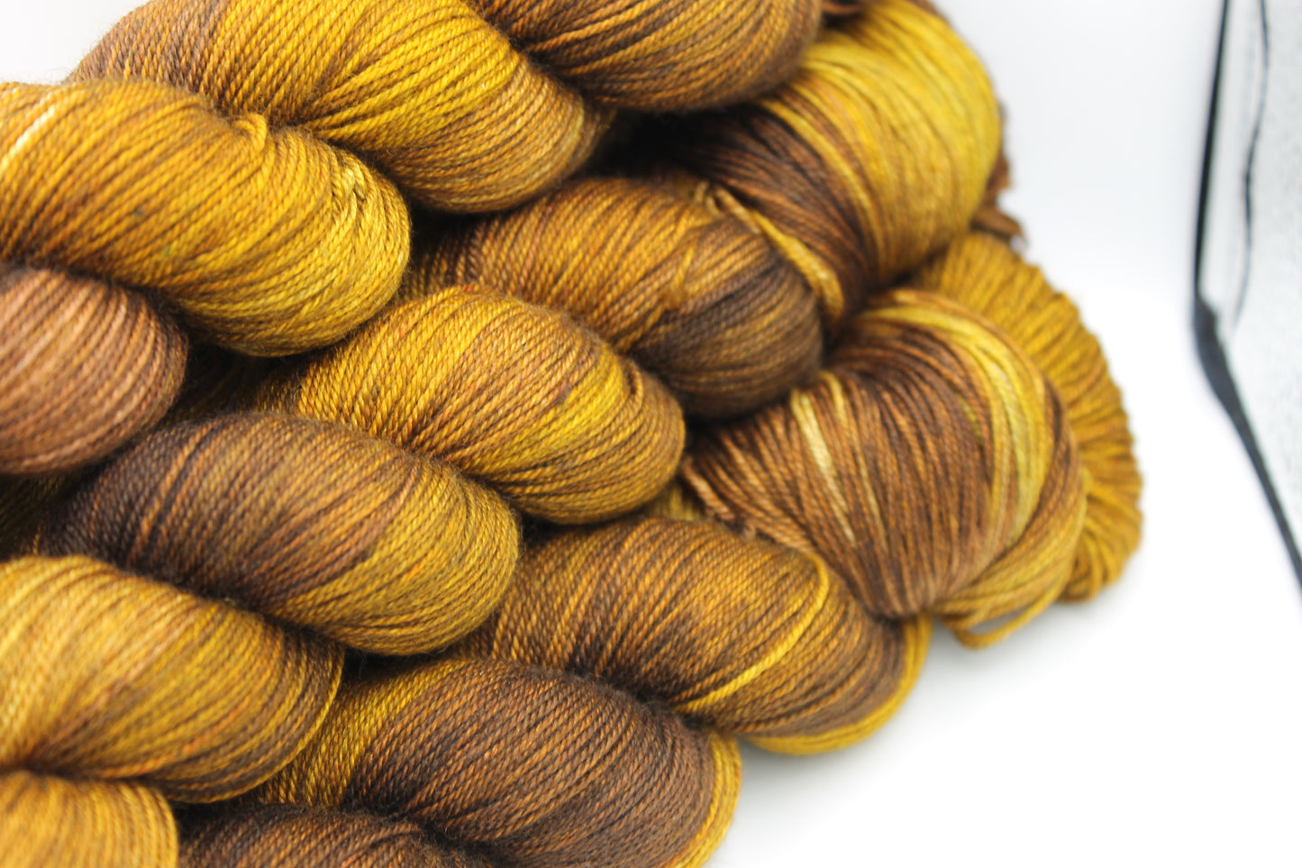 Toasted Honey Hand Dyed Yarn - 60% SuperWash Merino, 20% Silk, 20% Yak Sock Skein