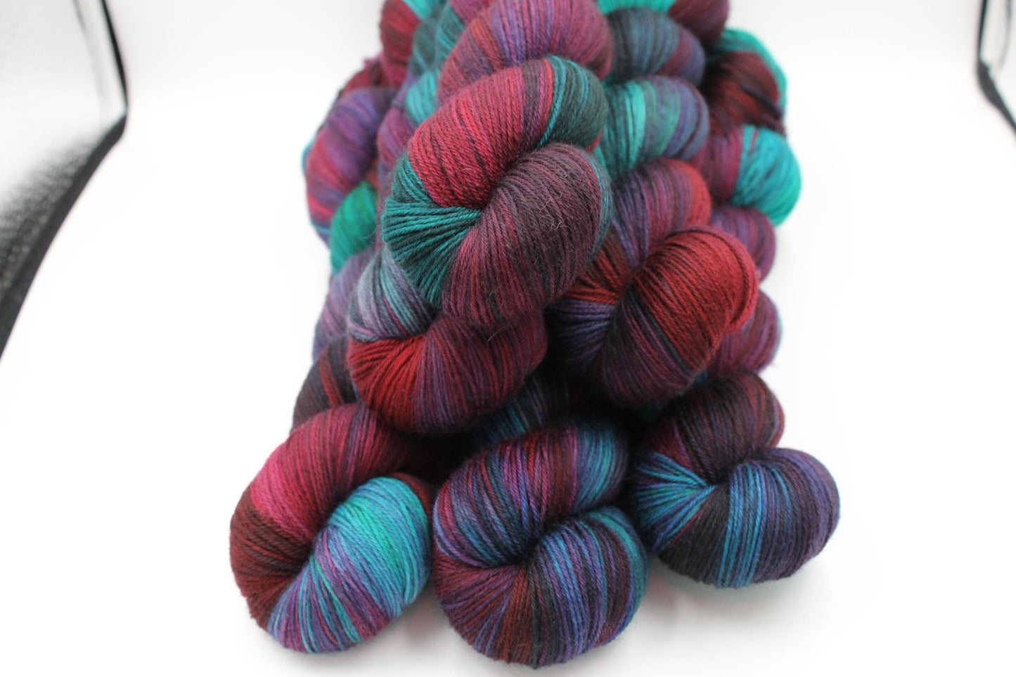 Sherlocks Smoking Jacket.  Sock skein 75% SuperWash Merino and 25 Nylon Hand Dyed Yarn 100g