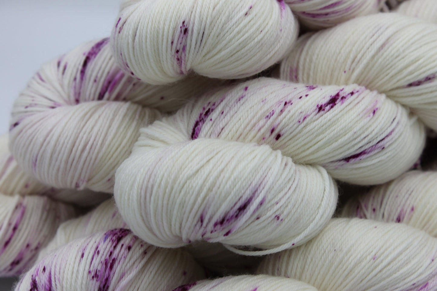 Wild Raspberry Light Speckle Sock Skein 75% SuperWash Merino and 25 Nylon Hand Dyed Yarn 100g