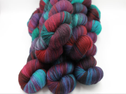 Sherlocks Smoking Jacket.  Sock skein 75% SuperWash Merino and 25 Nylon Hand Dyed Yarn 100g