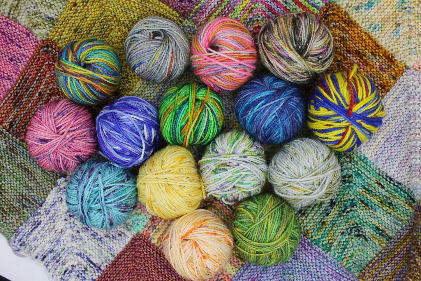 Pink Bear and Jemimas Mystery Blanket Balls Premium Sock SuperWash Wool 12 x 10g, Paw Wound