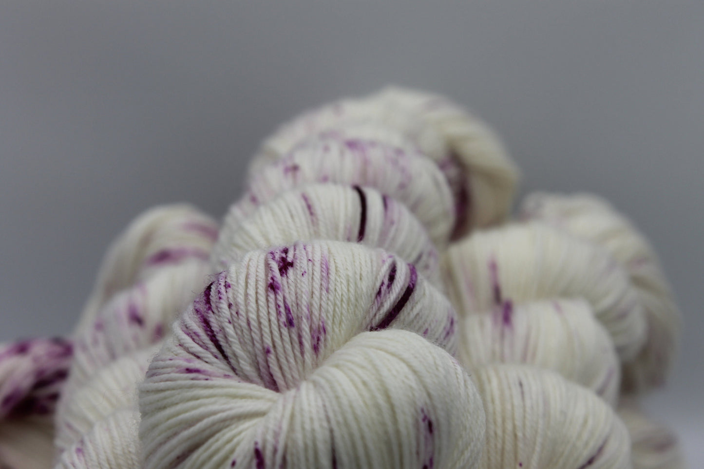 Wild Raspberry Light Speckle Sock Skein 75% SuperWash Merino and 25 Nylon Hand Dyed Yarn 100g