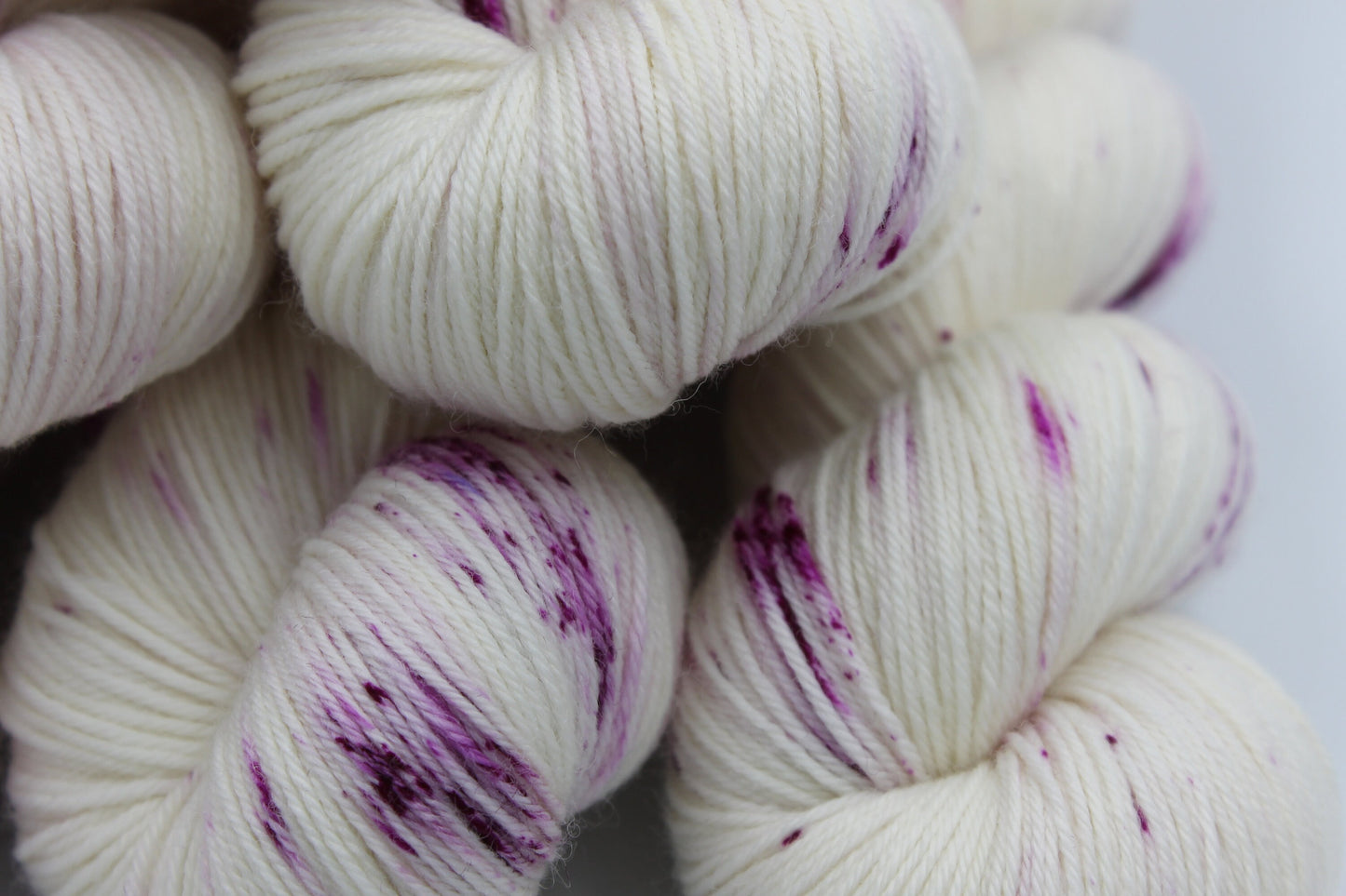 Wild Raspberry Light Speckle Sock Skein 75% SuperWash Merino and 25 Nylon Hand Dyed Yarn 100g