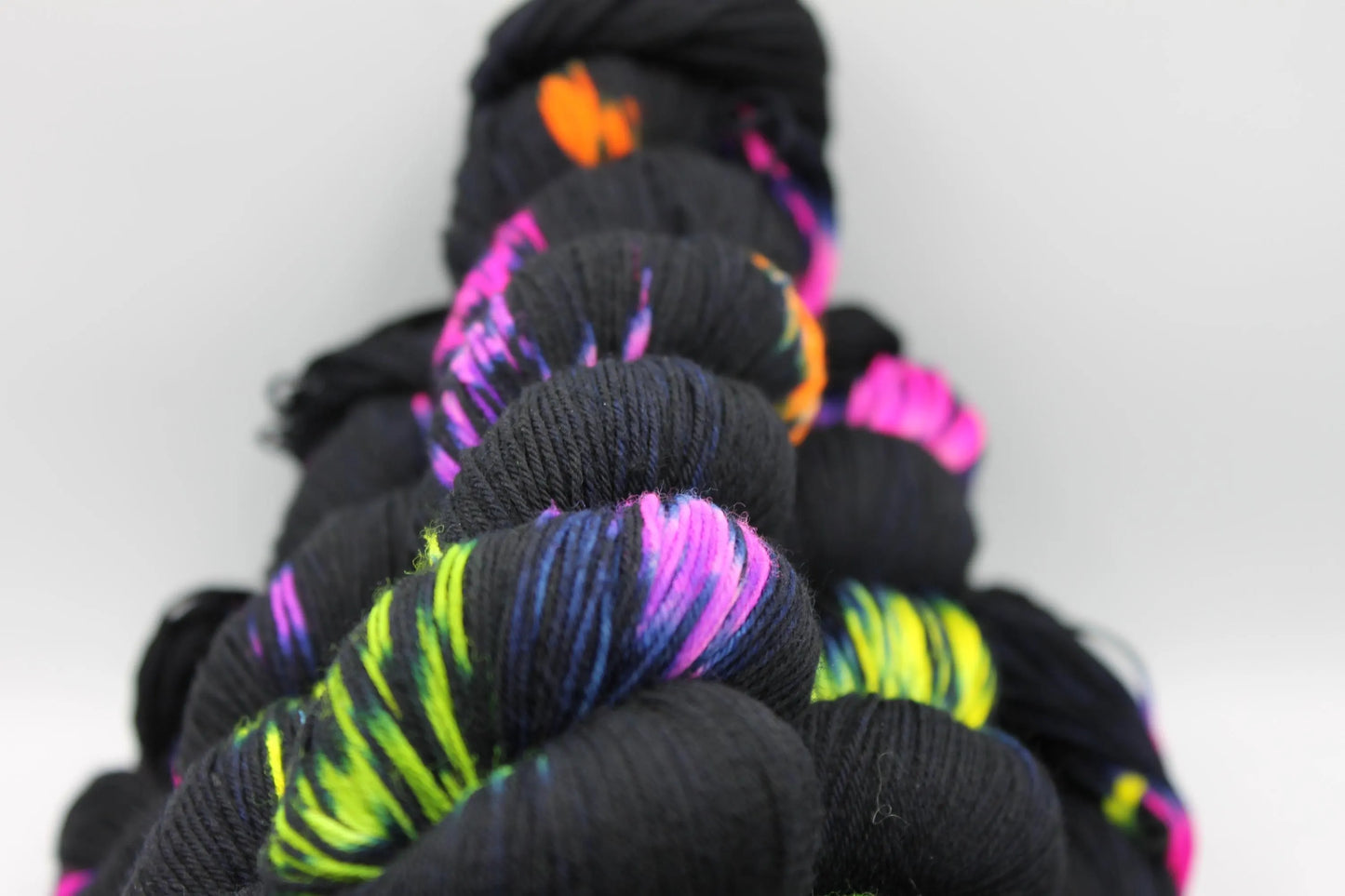 Neon Darkness,  Sock Skein 75% SuperWash Merino and 25% Nylon Hand Dyed Yarn 100g